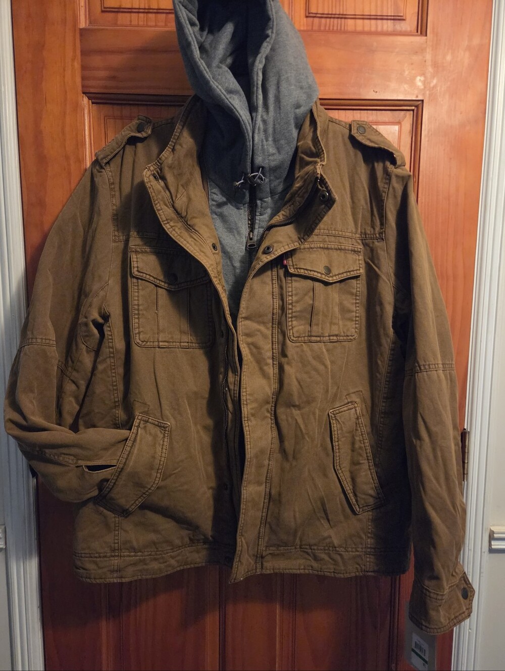 Levi's Military Trucker Jacket with a layered gray knit hood